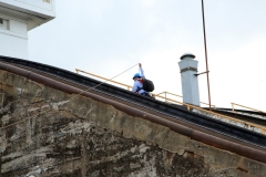Canal-worker-carying-line-up-the-steps