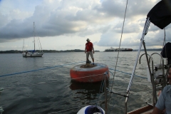 Moises-on-the-buoy-taking-the-lines